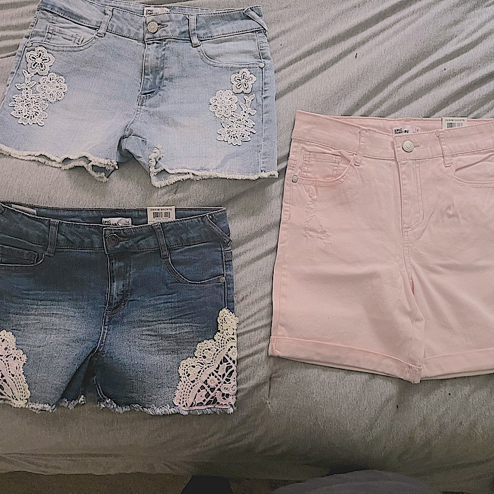 3pair of girls,brand new, size14 stretch denim shorts.Light blue,pink,dark blue.